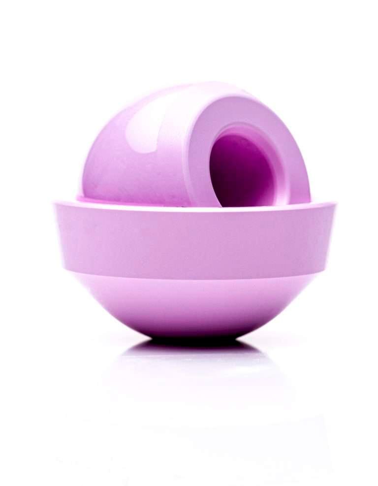 a purple round object with a hole